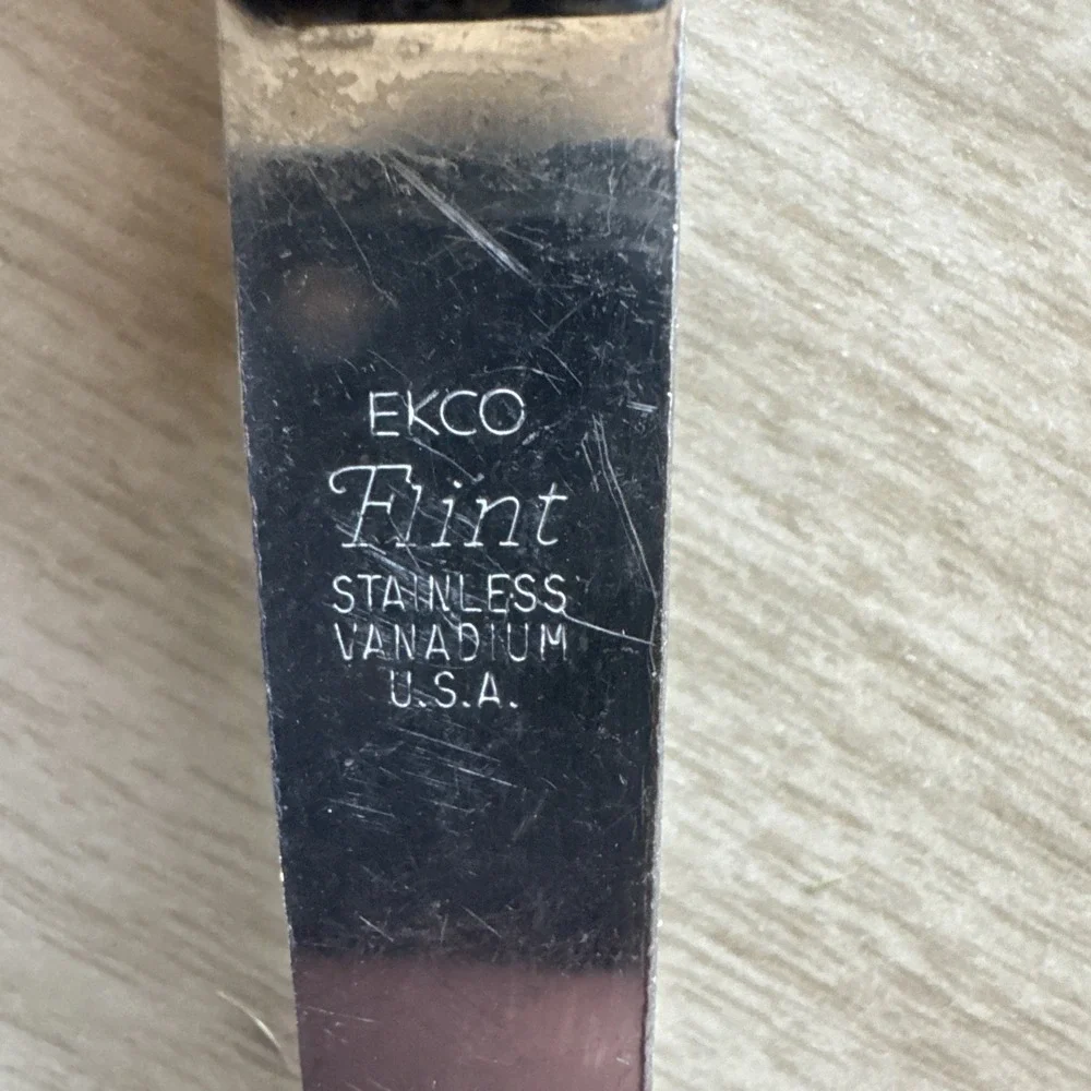 EKCO Flint Arrowhead Stainless Vanadium Slotted Serving Spoon Black Handle USA